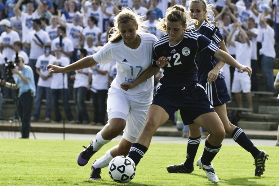 BJU’s Dani Lee battles Truett-McConnell’s Joy Smith for the ball during the Bruins’ first match.
 Photo: Amy Roukes 