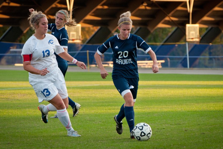 Defender Jill Iles protects the ball from the Hawks’ Shauna Anderson during Senior Night. The team has now won five of its past seven games. Photo: Emma Klak