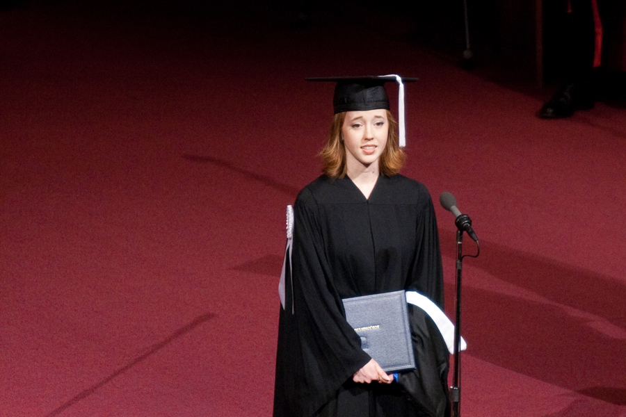 A 2010 graduate gives her testimony during last year’s commencement ceremony. Photo: Photo Services