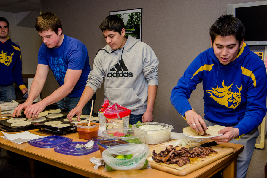 Ironside+resident+students+prepare+tacos+as+part+of+a+Bible+Conference+fundraiser.+Photos%3A+Jacob+Larsen