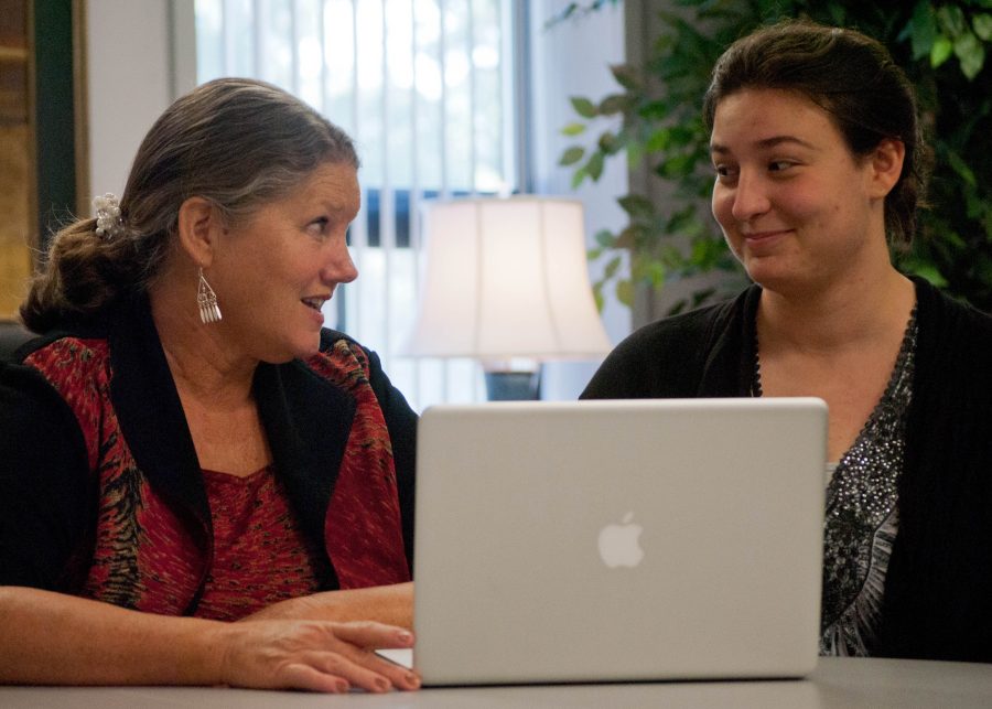 Mrs. Jonna Carper (left) of  the Academic Resource Center helps a student. Photo: Molly Waits