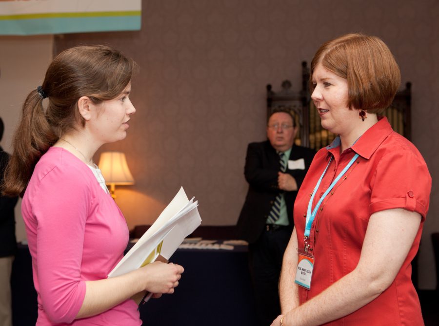 A student converses with Miss Mary Ellen Boyle, BJU’s social events coordinator, at a previous BJU Job Fair.  Photo: Photo Services 