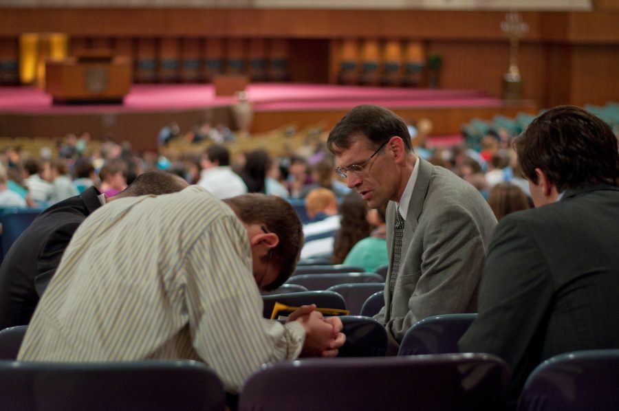 Faculty and students participate in a prayer session on last semester’s Day of Prayer.  Photo: Emma Klak