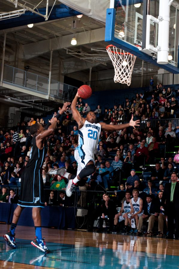 Guard Darnel Antoine takes a high-flying shot at Piedmont’s net.   Photo: Amanda Ross