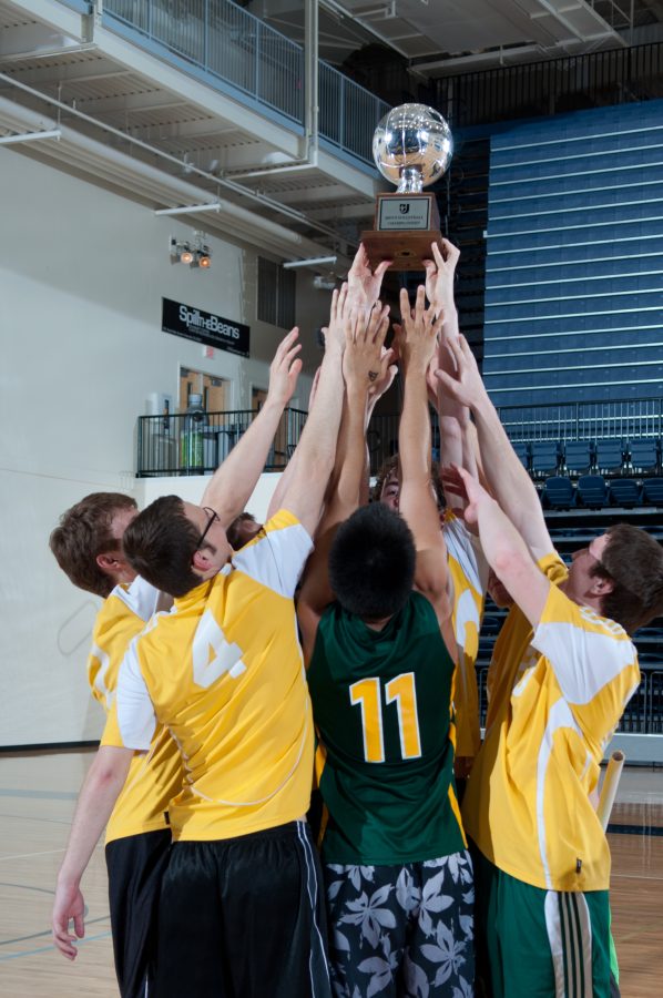 The Pi Kappa Sigma Cobras recently won their third straight intramural volleyball championship. Photo: Amanda Ross