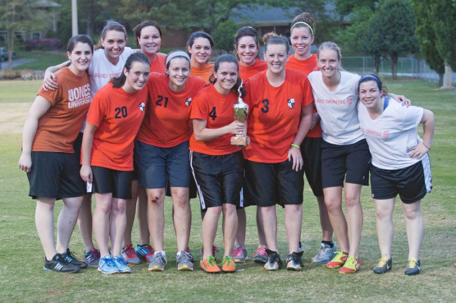 The+Theta+Delta+Omicron+Tigers+celebrate+their+softball+championship+win%2C+their+fifth+championship+this+year.+Photo%3A+Molly+Waits