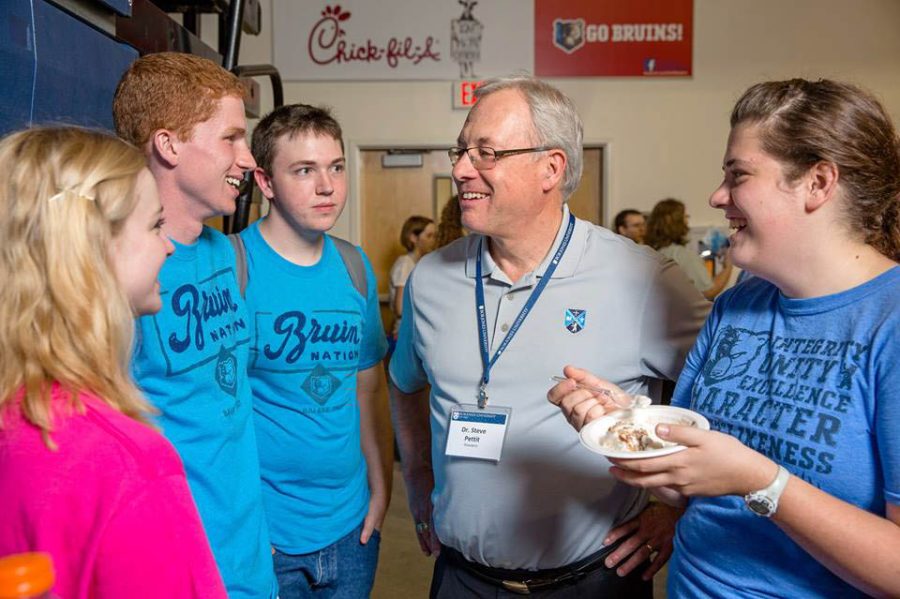 BJU president Steve Pettit fellowships with students during check-in. Photo: Photo Services