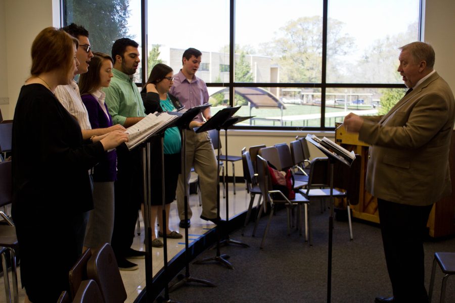 Dr. David Parker leads Opus 6 in rehearsal for the group’s concert Saturday night in War Memorial Chapel. Photo: Ethan Rogers