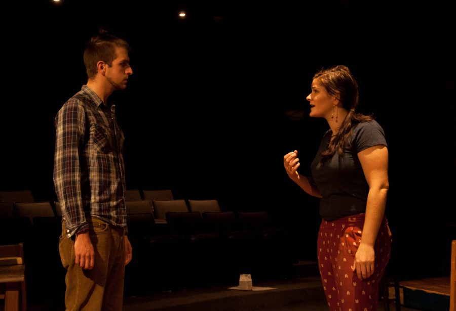 Jason Houtz, playing a Nazi, and Meredith Hamilton, playing a brave student, rehearse for White Rose. Photo: Tatiana Bento