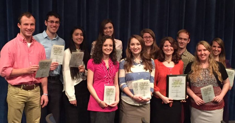 The Collegian staff members pose with their awards. Photo: Betty Solomon