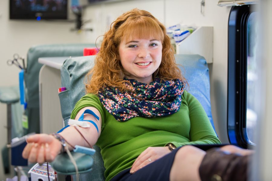 Students+give+blood+on+the+bloodmobiles+visiting+on+campus.+Photo+by+Derek+Eckenroth%2C+2015