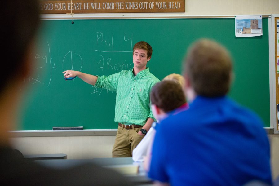 A society chaplain delivers a devotional during a Friday society meeting.    Photo: BJU Marketing/ Derek Eckenroth