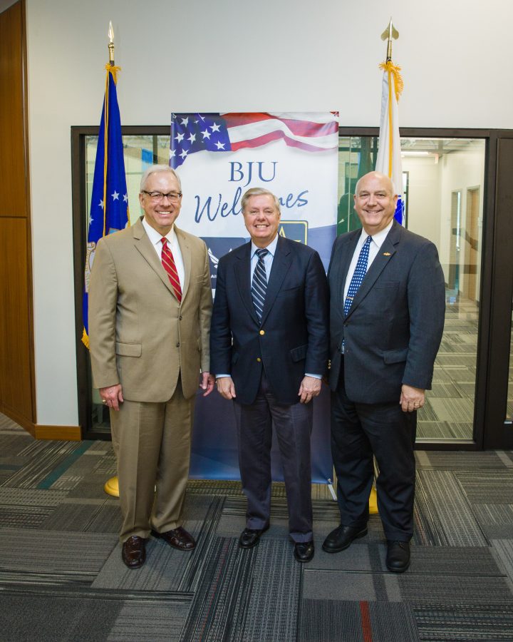 Sen. Lindsey Graham (R-SC) recently presented President Steve Pettit and Al Carper of the BJU business faculty a flag that flew above the U.S. Capitol. Beginning in the fall semester, BJU will offer crosstown partnerships with the ROTC programs at Furman and Clemson universities. Graham was a chief supporter of BJUs in acquiring the crosstown partnerships. Carper, retired U.S. Navy Commander, will serve as BJUs ROTC adviser. Photo: BJU Marketing/Hal Cook