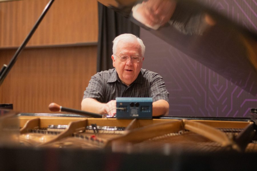 Ed Rea has 45 years of experience maintaining pianos. Photo: Collin Bode