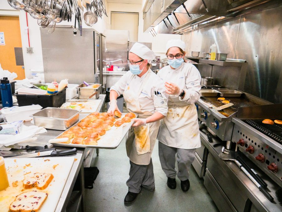 Angelica Wilkie and Dominique Statuti prepare orders for the Bistro.
Photo: Nathaniel Hendry
