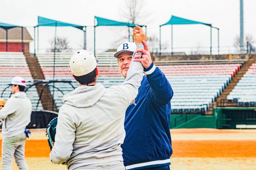 Jamie Moyer instructs BJU pitcher Henry Wallach during practice. Photo: Lindsay Shaleen