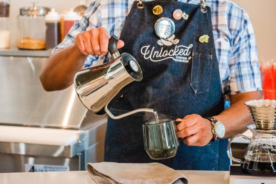 Camrago pours hot water directly onto coffee grounds, the water then filtered to make a traditional
pour-over coffee. Photo: Madeline Peters