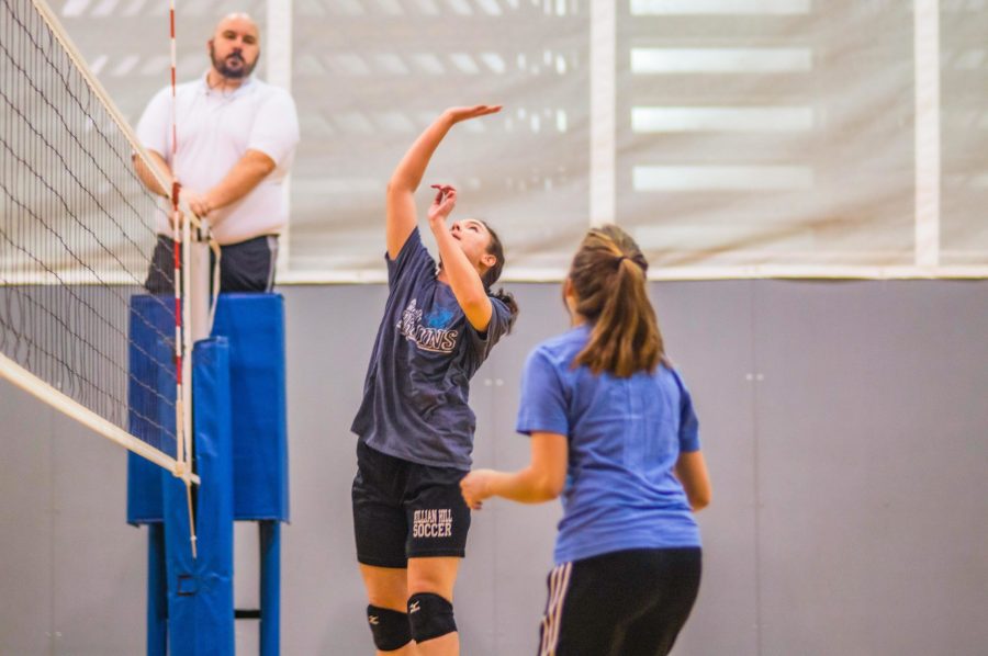 Tau Delta Chi Kangas volleyball captain Aimee Tewes jumps to spike. Photo: Lindsay Shaleen
