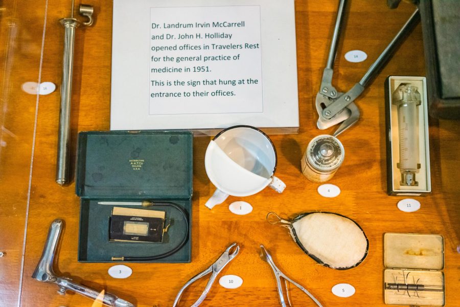 An arrangement of antique medical tools, labeled with nearby explanations, displays part of the medical treatment history of Travelers Rest. Photo: Nick Zukowski