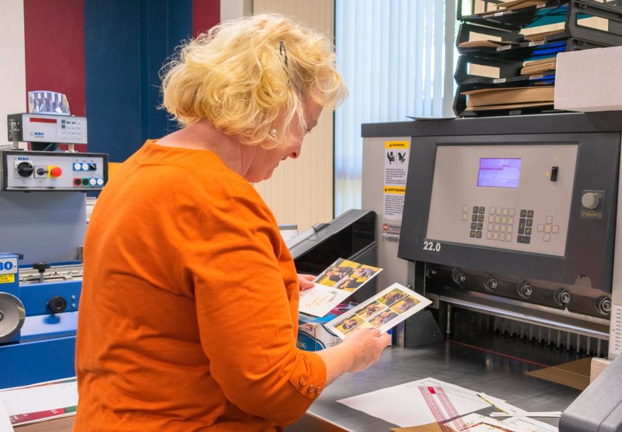 Cindy Unruh works as a copy technician for Bellis Copy Center.Photo: Melia Covington