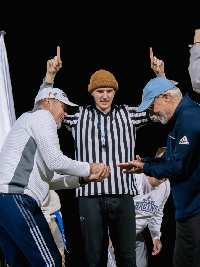 The game ended in the most fair way possible, according to game announcer Trey Woodberry: a friendly game of rock-paper-scissors. Photo: Nathaniel Hendry