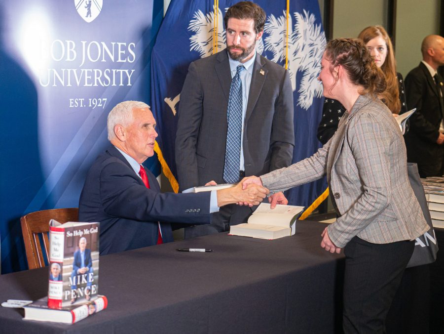 After speaking, Pence signed copies of his bestselling book, So Help Me God. Photo: Nathaniel Hendry