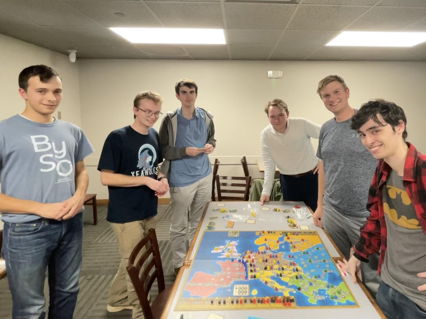 Members of the Chi Epsilon Delta Wolves at a board game activity. Pictured left to right is Benjamin Hyink, Benjamin Ewing, Caleb McGinnis, Ethan House, Sam Ingersoll and Ethan Collins. / Provided by XED Wolves