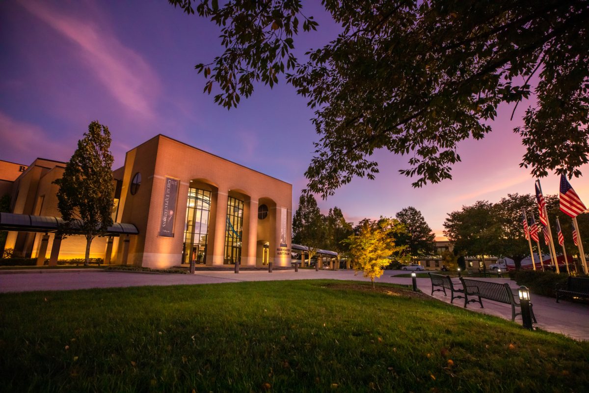 Rodeheaver Auditorium sits in light from setting sun, BJU, October 22, 2019. (Hal Cook)