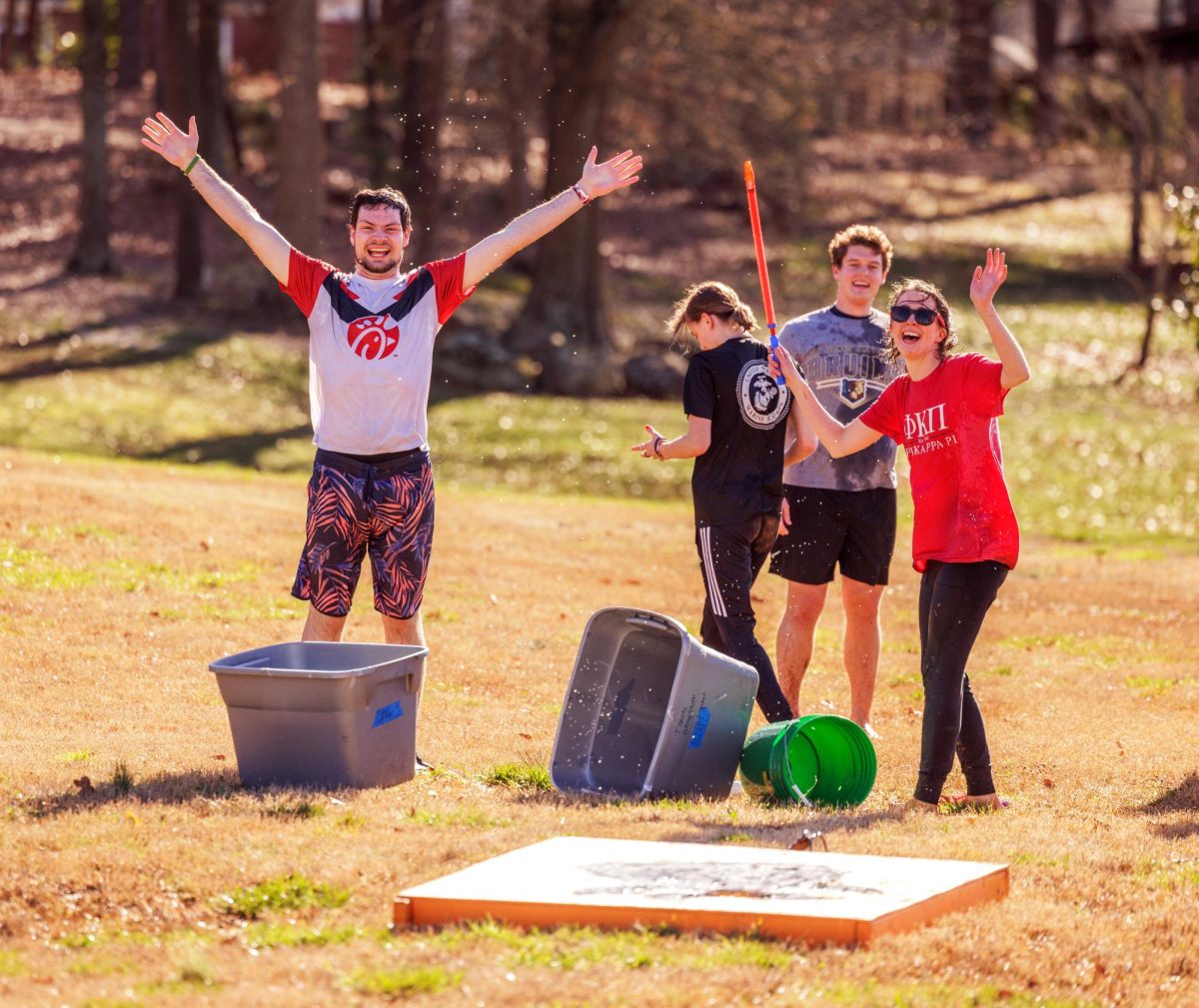 The Theta Delta Omicron Tigers and the Pi Kappa Phi Rams host a Water Wars Bible Conference fundraiser. Photo by BJU.