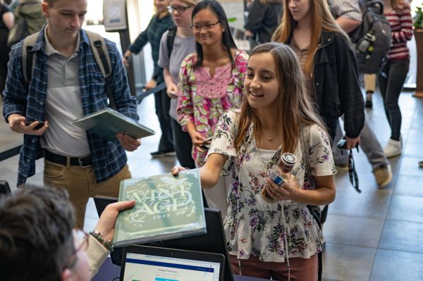 Distribution of the 2023 Vintage yearbook in Rodeheaver Lobby. Photo courtesy of BJU.