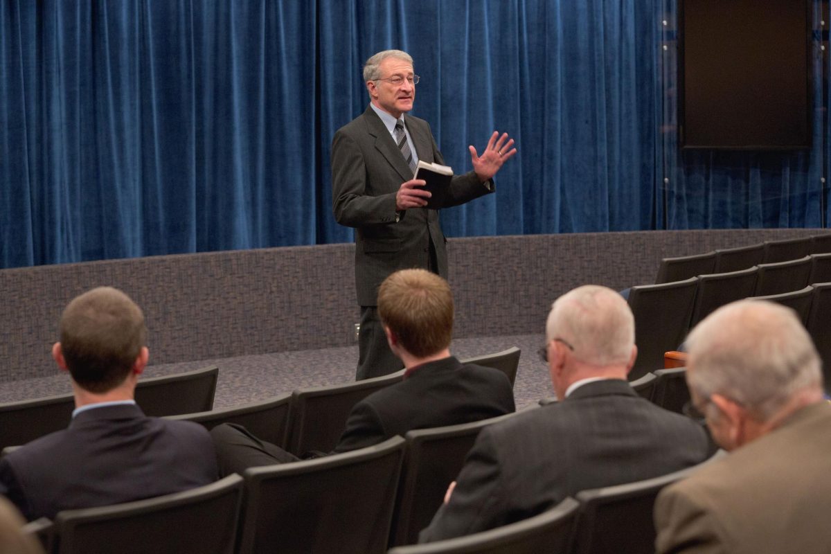 Dr. Bruce McAllister leads a preachers prayer meeting in 2013. Photo courtesy of BJU.