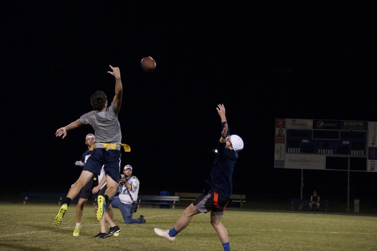 BJU faculty participate in a flag football game.