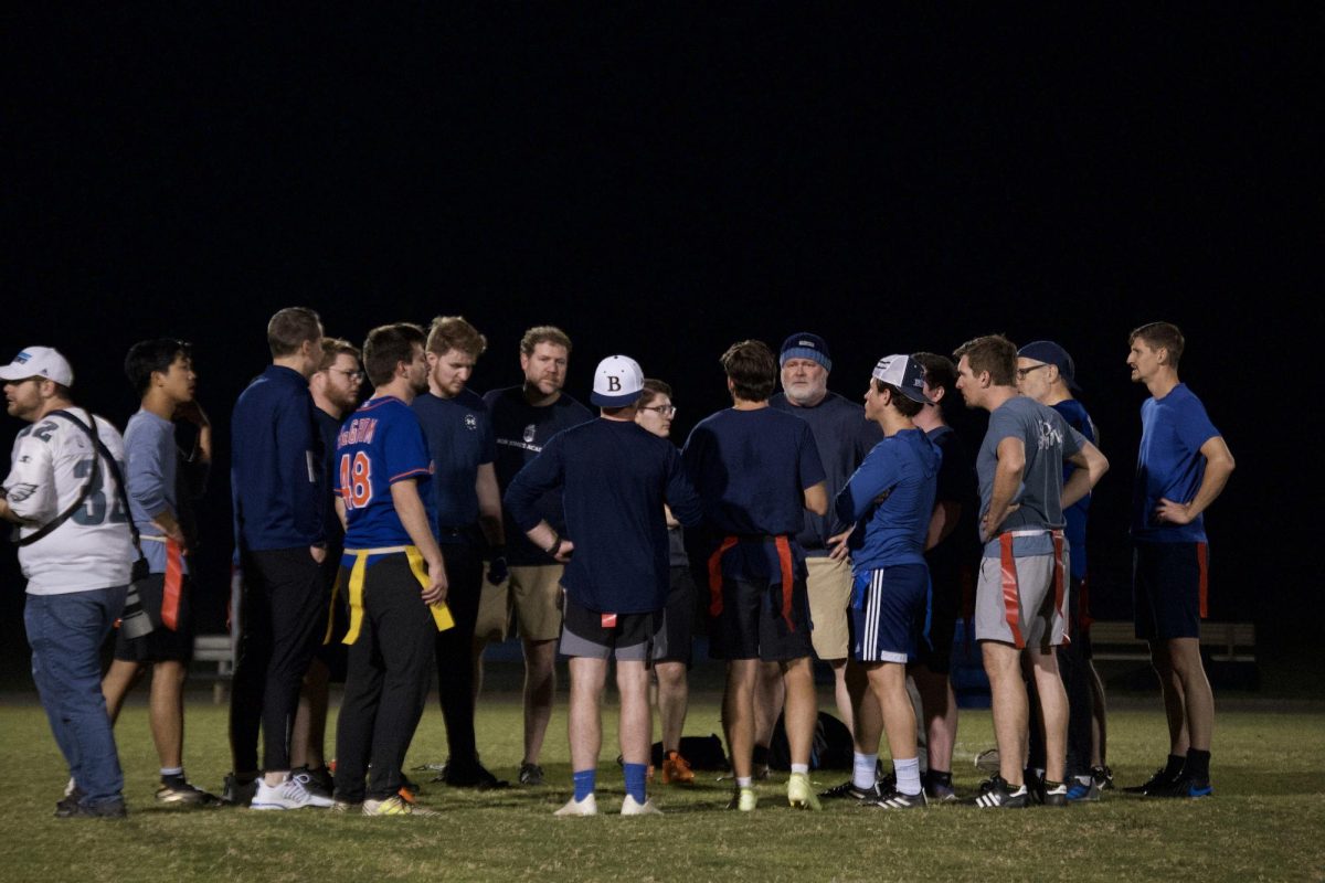 BJU faculty participate in a flag football game.