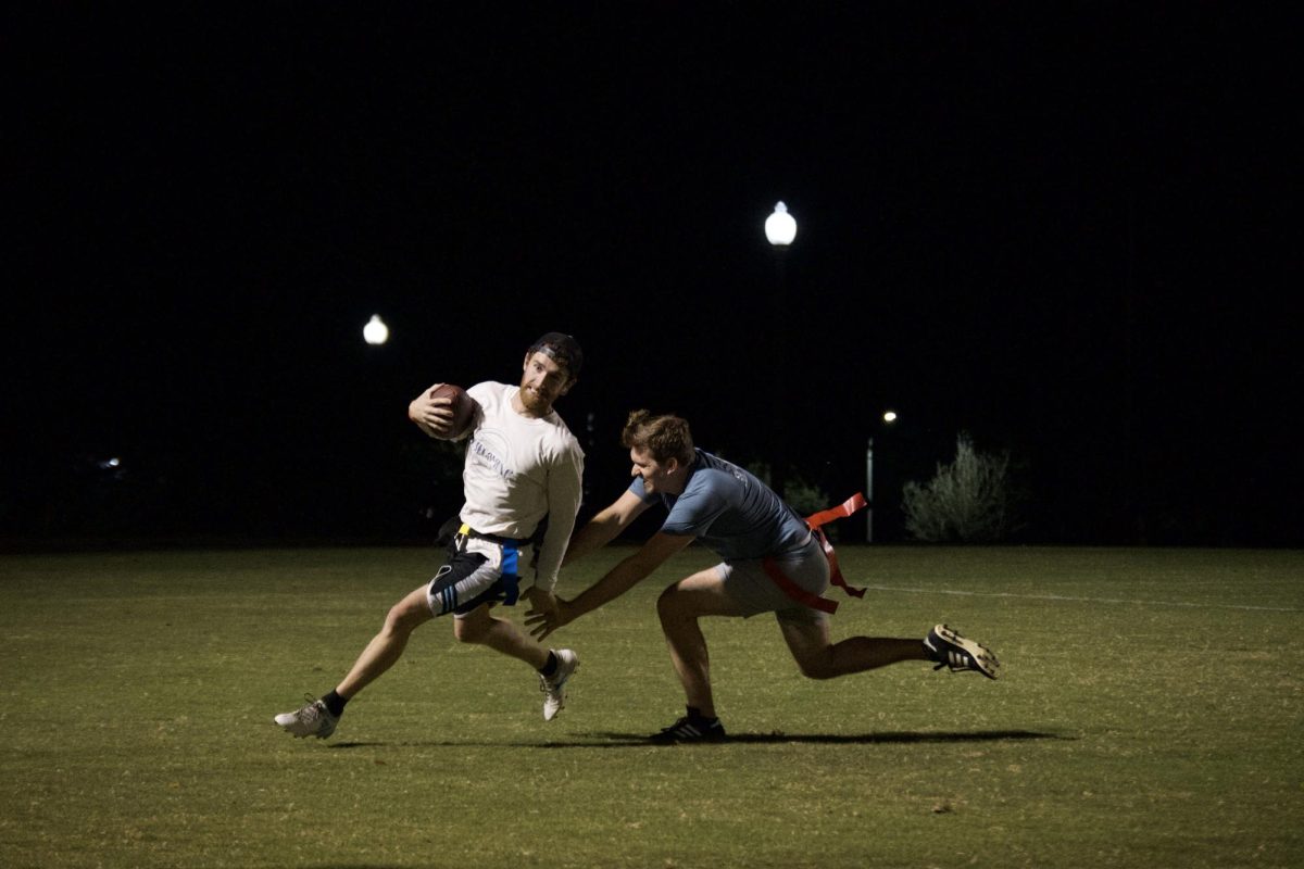 BJU faculty participate in a flag football game.