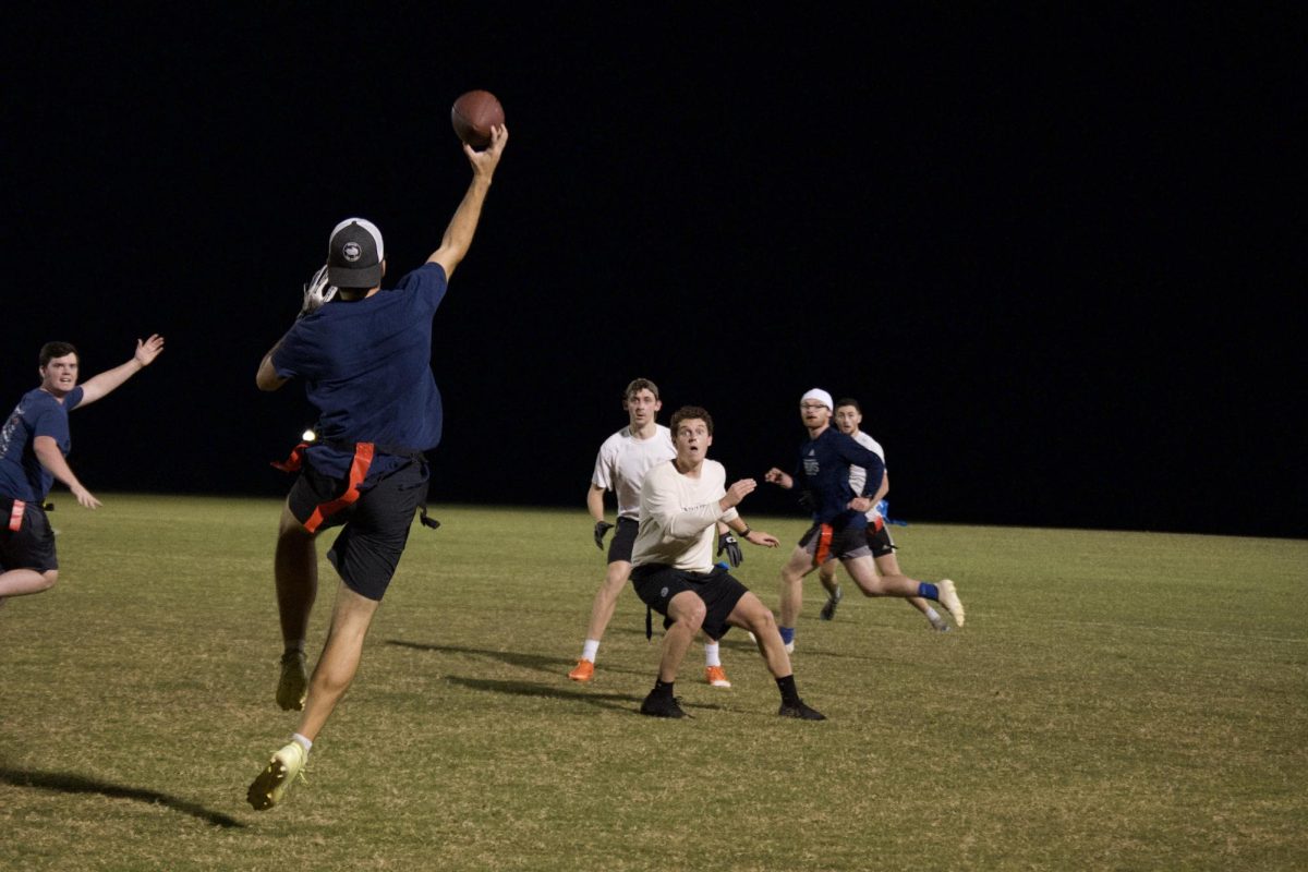 BJU faculty participate in a flag football game.