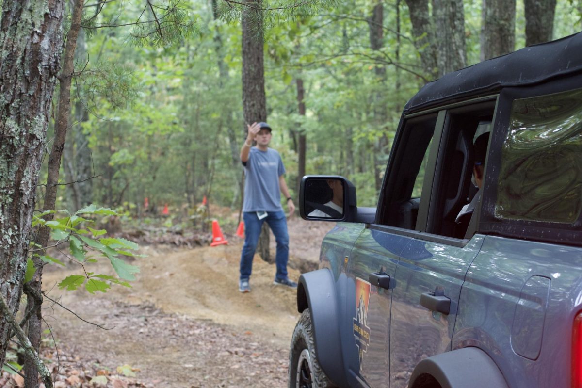 Josiah Sherrill, a senior Biblical studies major, calling out directions for blind driving.