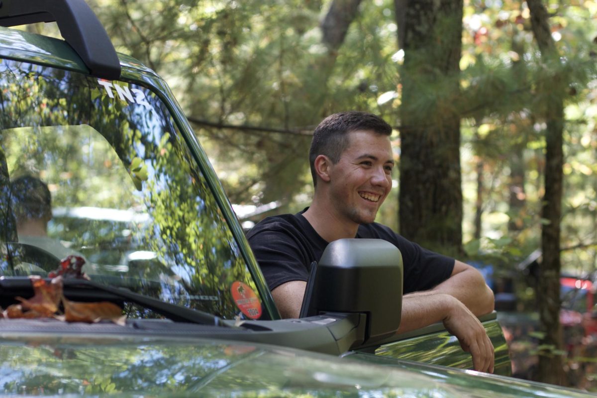 Holden Weisbecker, a junior business administration major, chilling with the bronco.