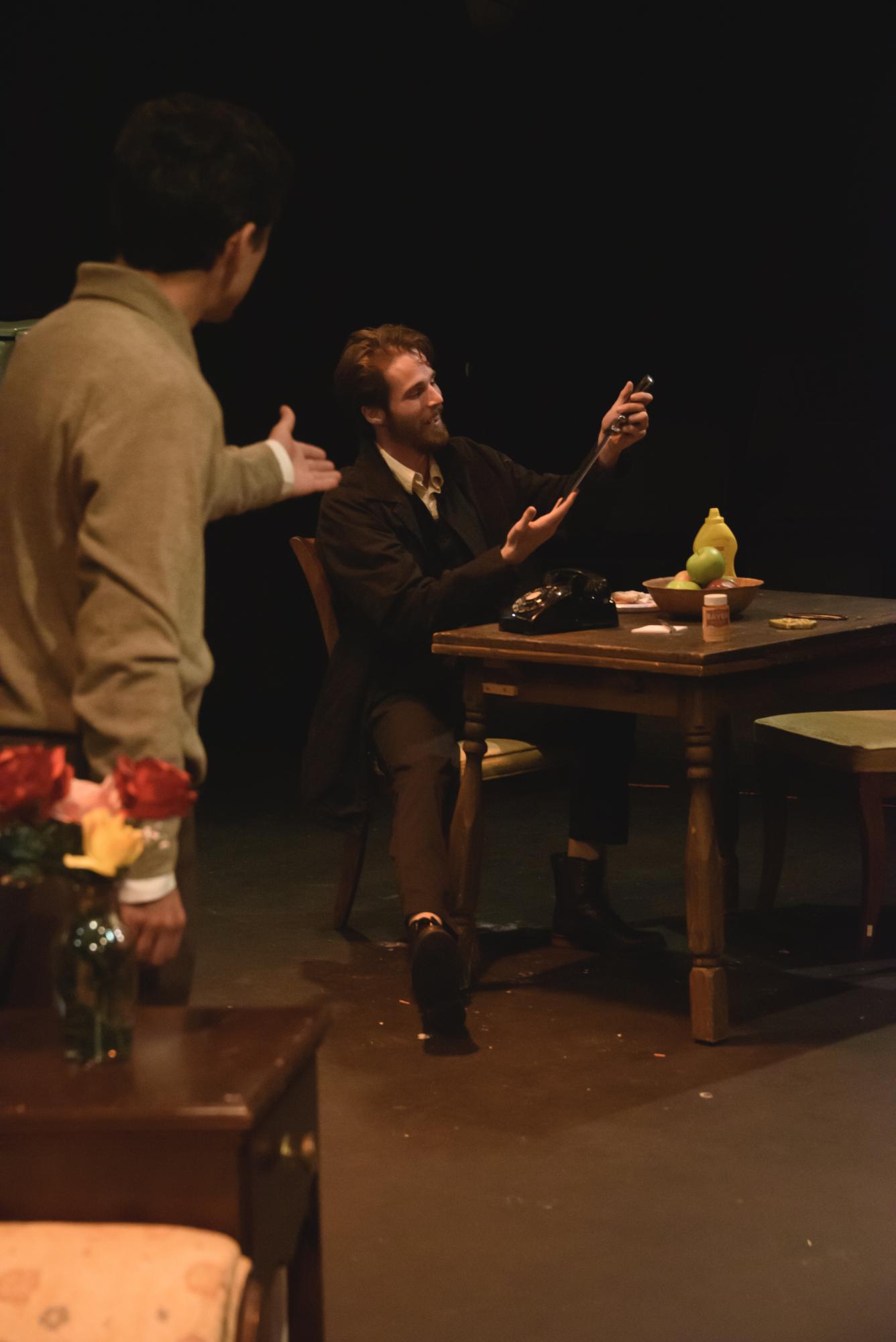 John Cassidy and Nathan Barnes act in "Wait Until Dark."