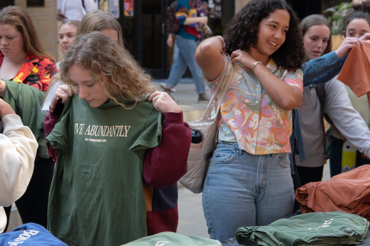 Students sell pancakes and shirts for hurricane relief in North Carolina.