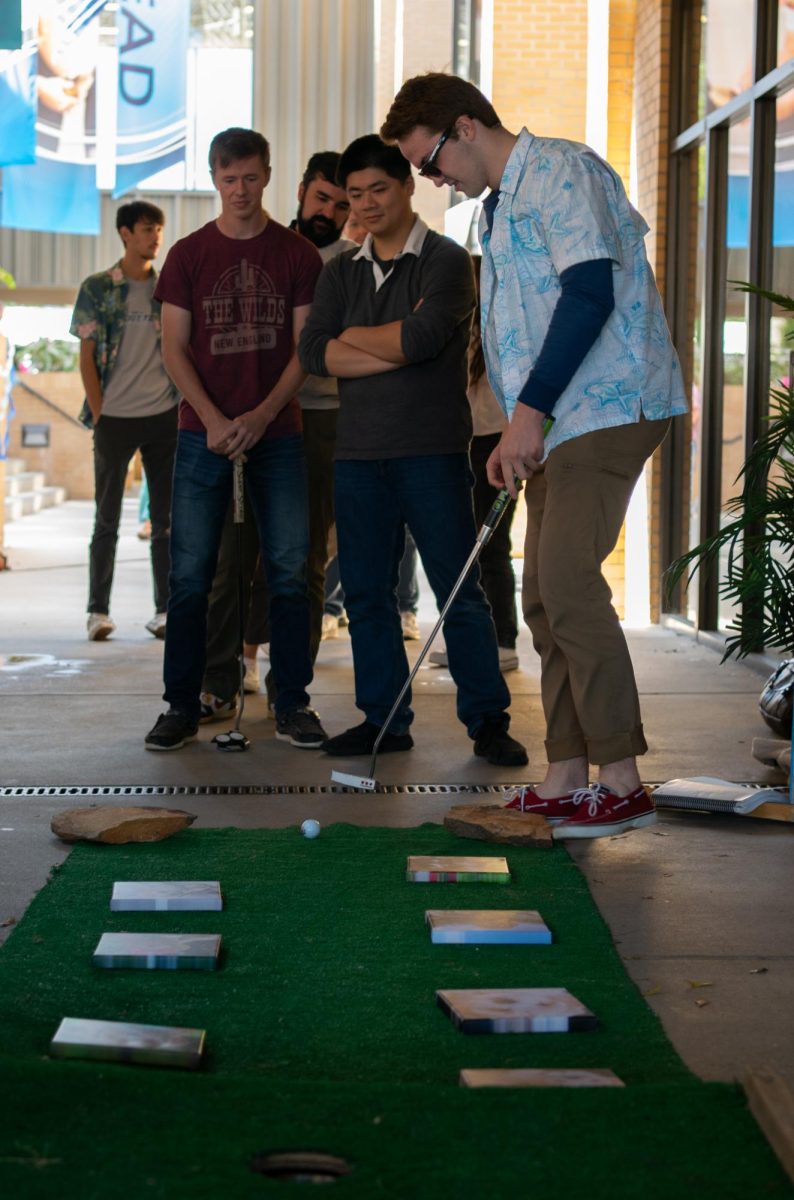 Students try the Crockett Doodles hole-in-one challenge.