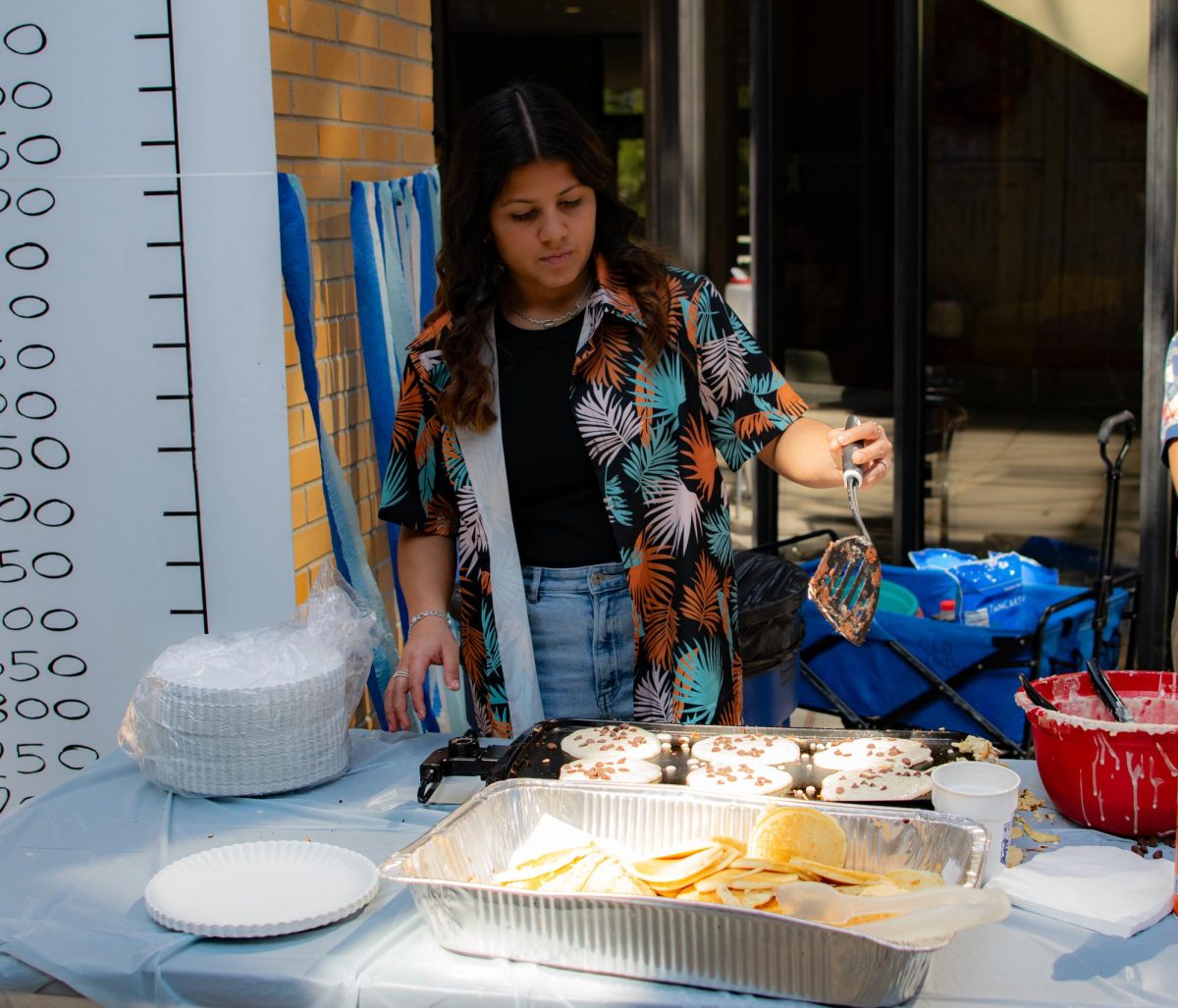 Students sell pancakes and shirts for hurricane relief in North Carolina.