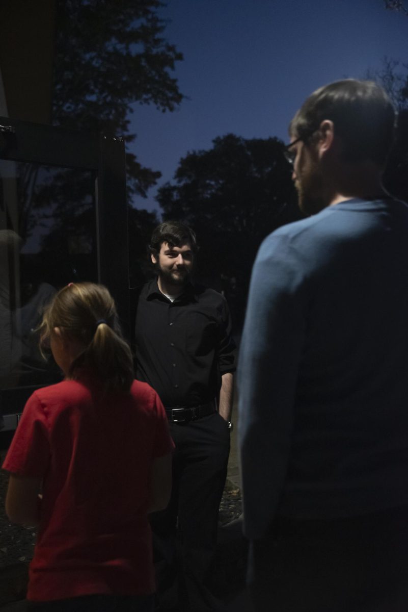 Audience members walk in to see Wait Until Dark directed by Taylor Stephens.