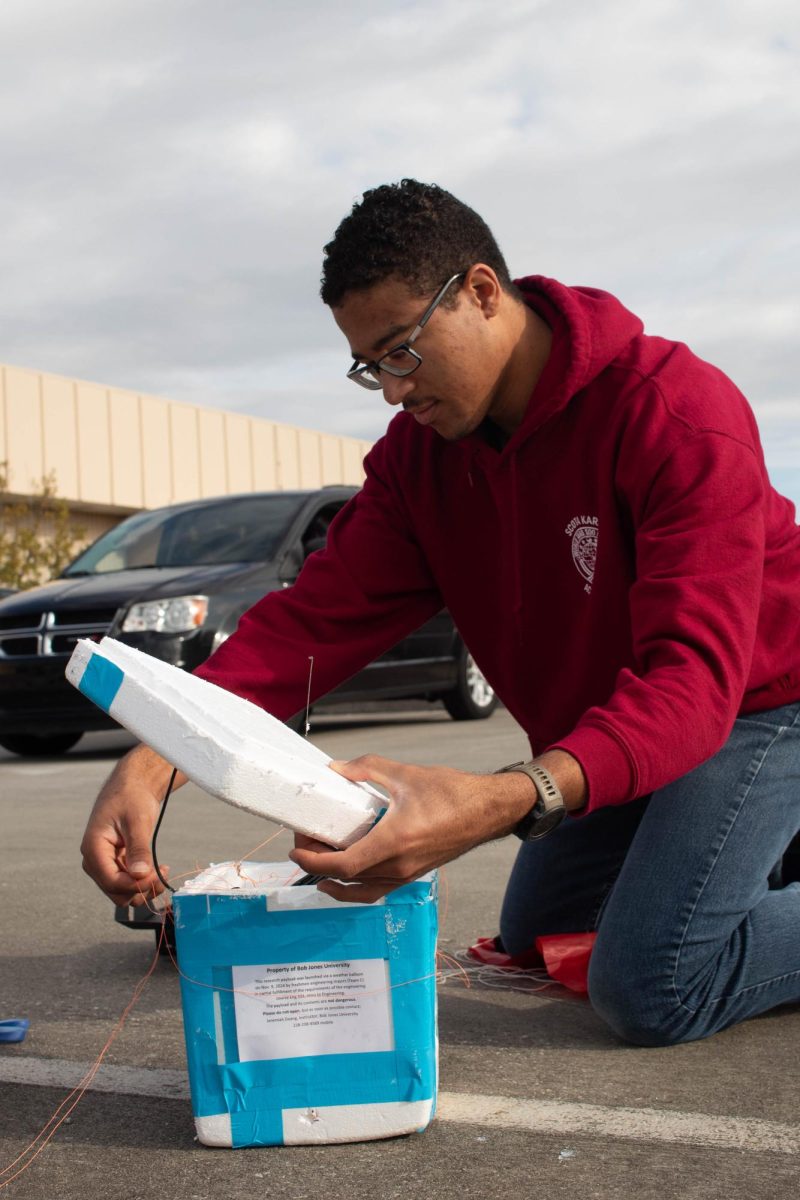 A student works on the payload.