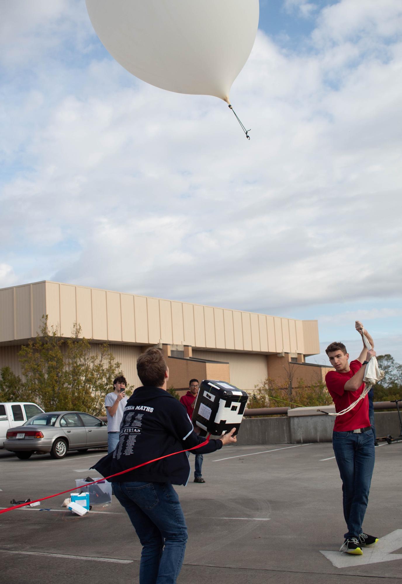 Students release the weather balloon.