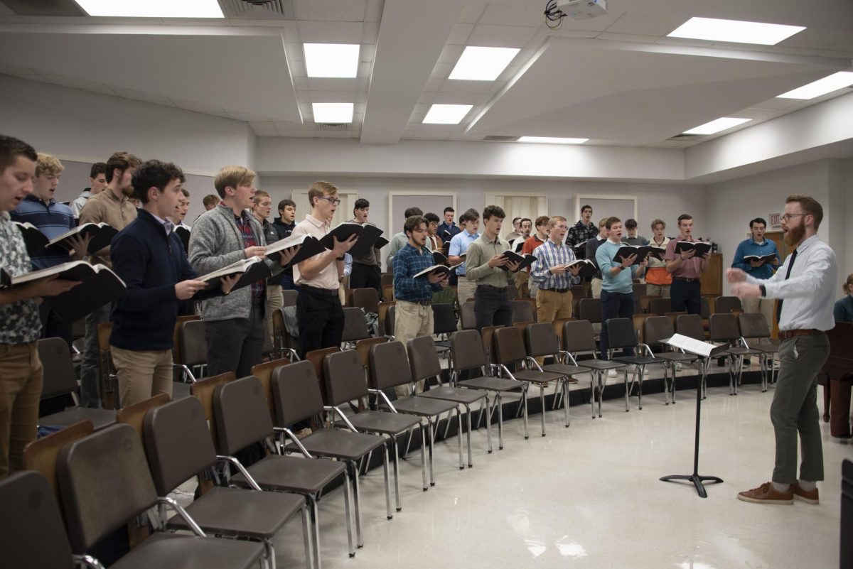 Choirs preparing for Handel's Messiah in sectionals in the Fine Arts Building, 2024.