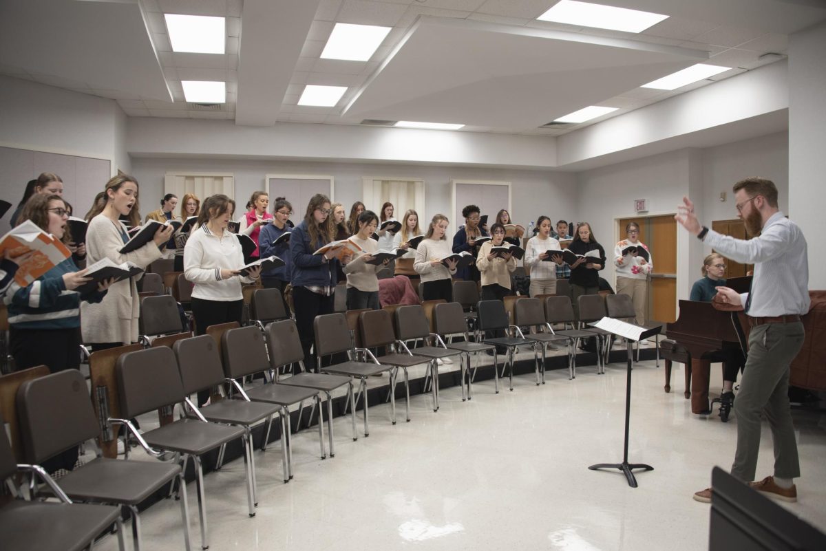 Choirs preparing for Handel's Messiah in sectionals in the Fine Arts Building, 2024.