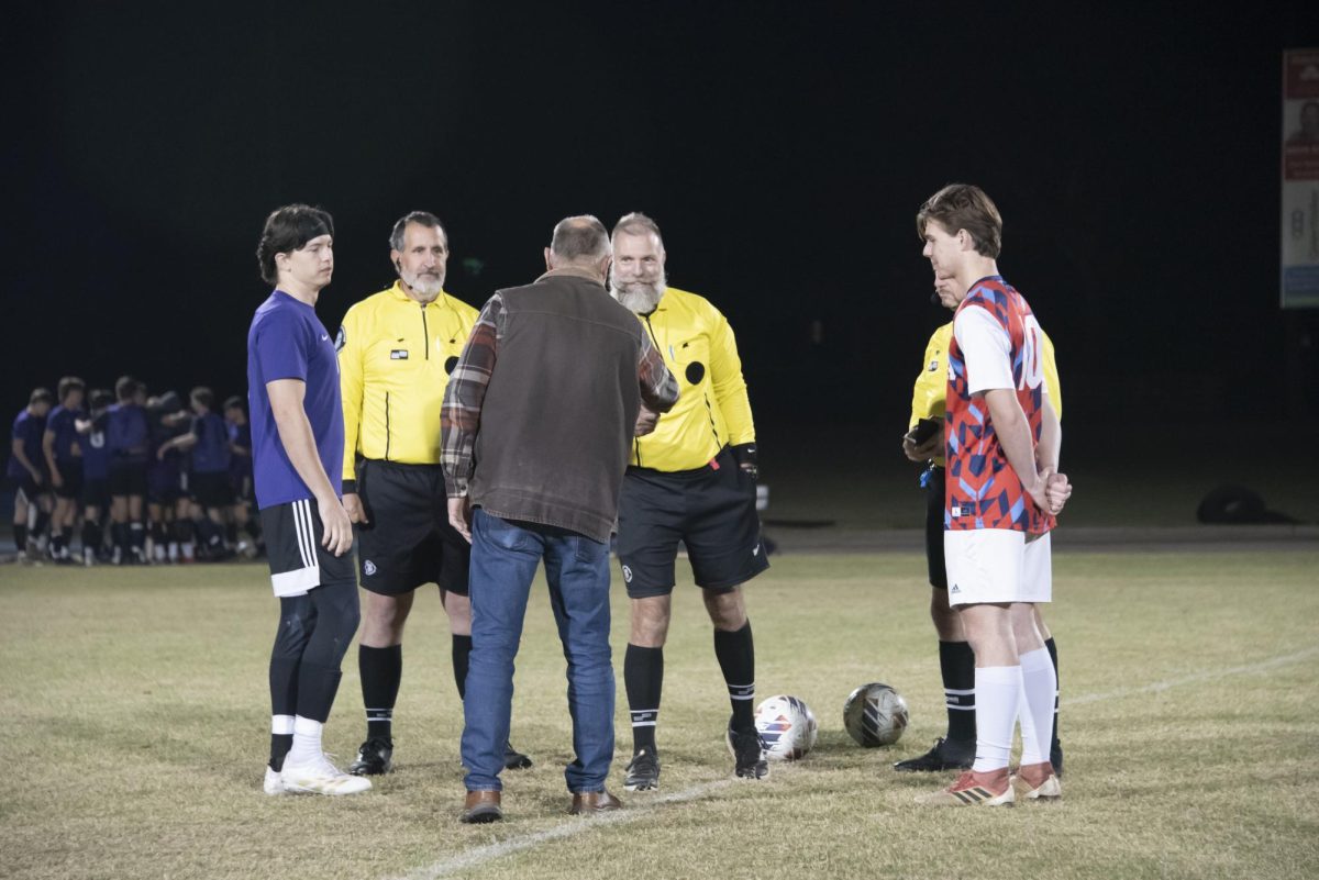 Turkey Bowl, 2024. Men's 11-on-11. Royals vs. Spartans. Opening coin toss.