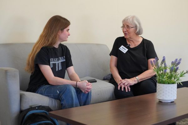 The Collegian's Abigail Vogel, left, interviews Miss Kathy Tovrea on a couch in the BJU Dining Common. Photo by Jonathan Lovegrove.