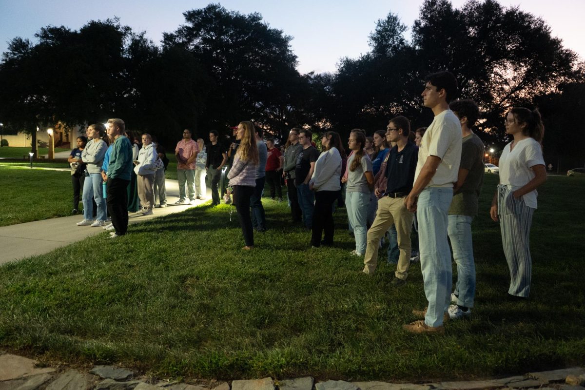Students gather on Palmetto Green for a prayer meeting, Sept. 11, a day after Christian conservative activist Charlie Kirk was killed. 