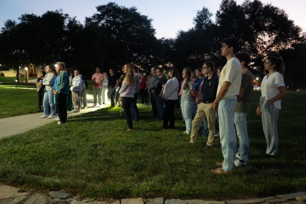 Students gather on Palmetto Green for a prayer meeting, Sept. 11, a day after Christian conservative activist Charlie Kirk was killed. 